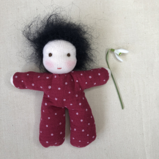 red Waldorf inspired doll